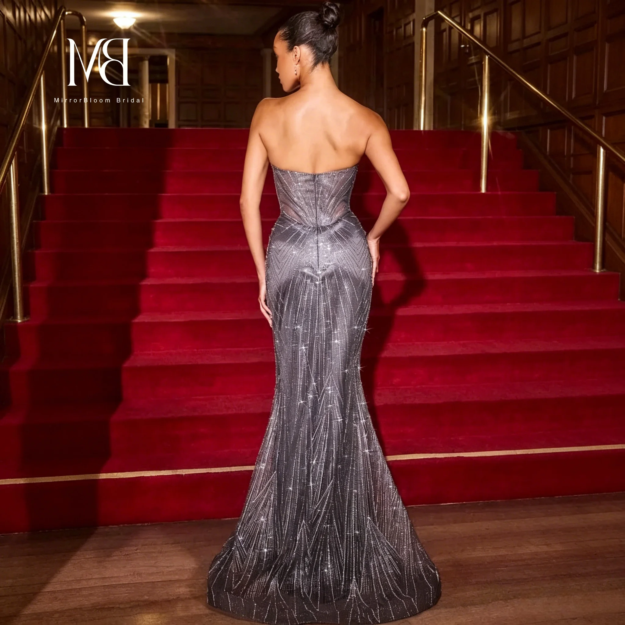 Pink strapless sleeveless floor-length mermaid formal gown featuring boning sequins and beadwork