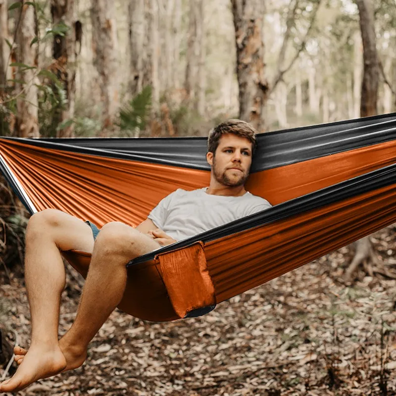 Outdoor camping tent travel folding portable hammock, made of parachute fabric, suitable for outdoor camping use.