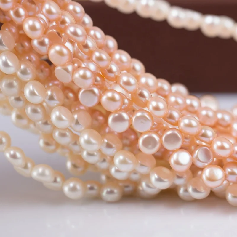 

diy 7-8 mm side drilled AAA fresh water stringed button shape pearl