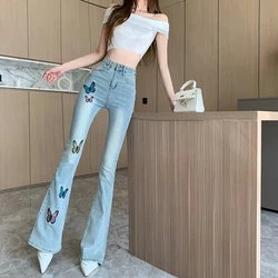 2023 primavera nuova farfalla ricamo Denim Micro Flare pantaloni a vita alta moda pantaloni temperamento Slim Show Jeans donna sottile