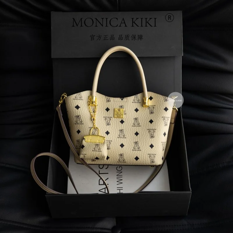 

Classic Tote Bags For Ladies By Famous Designer, Elegant Leather Exterior And Roomy Compartment, Perfect For Office Or