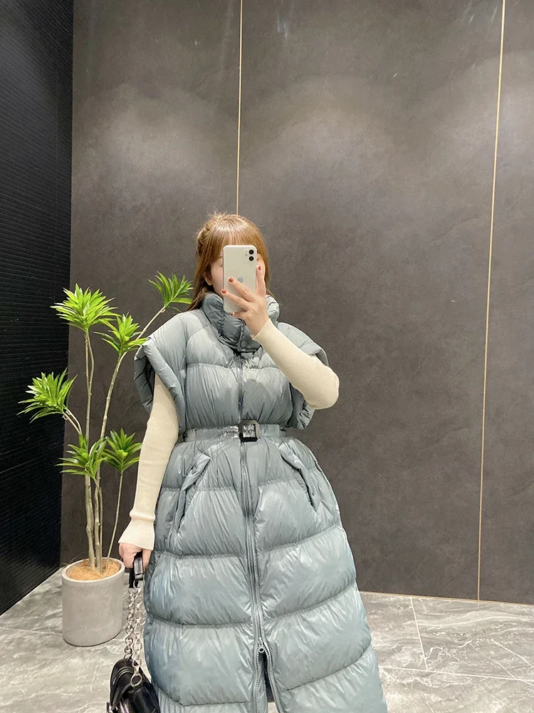 2024 Winter Neue Rosa Lange Unten Weste Frauen Lose mit Gürtel Batwing Hülse Stehkragen Gerade Unten Mantel Koreanische Mode outwear