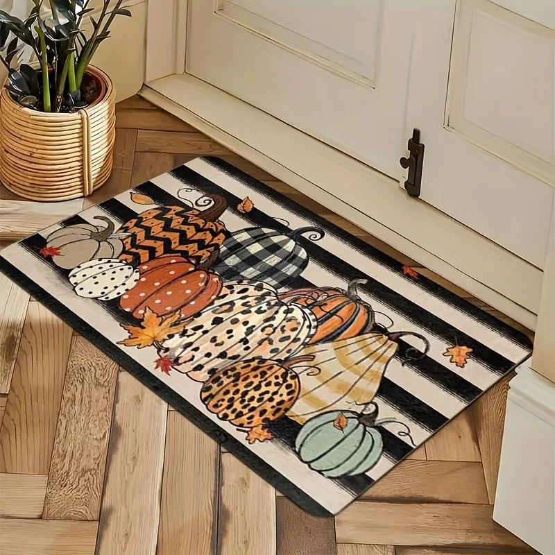 Autumnal welcome mat with pumpkin adorned bow and cursive text on textured orange base for porch and entryway decoration