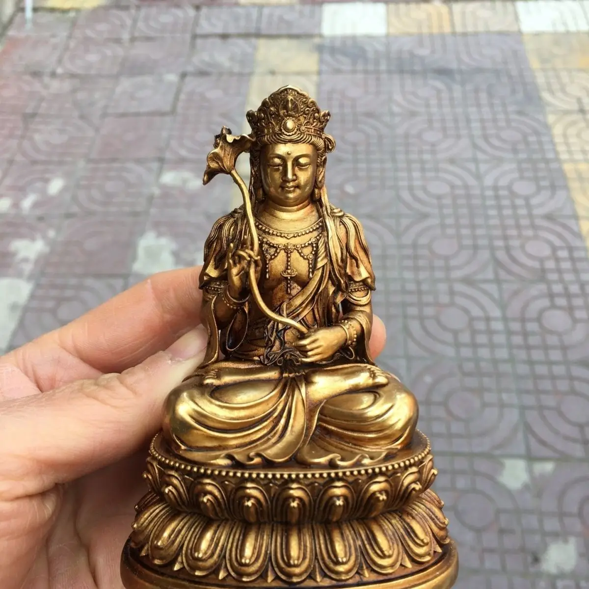 

Copper imitation gilt trend to Bodhisattva Buddha statue width 7cm high 10cm thick 6cm weight about 0.6 kg