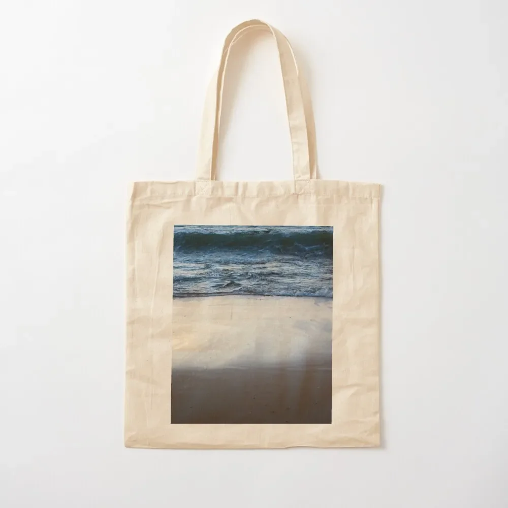 

Waves breaking on shimmering sands. Tote Bag Shopper great bag Tote Bag