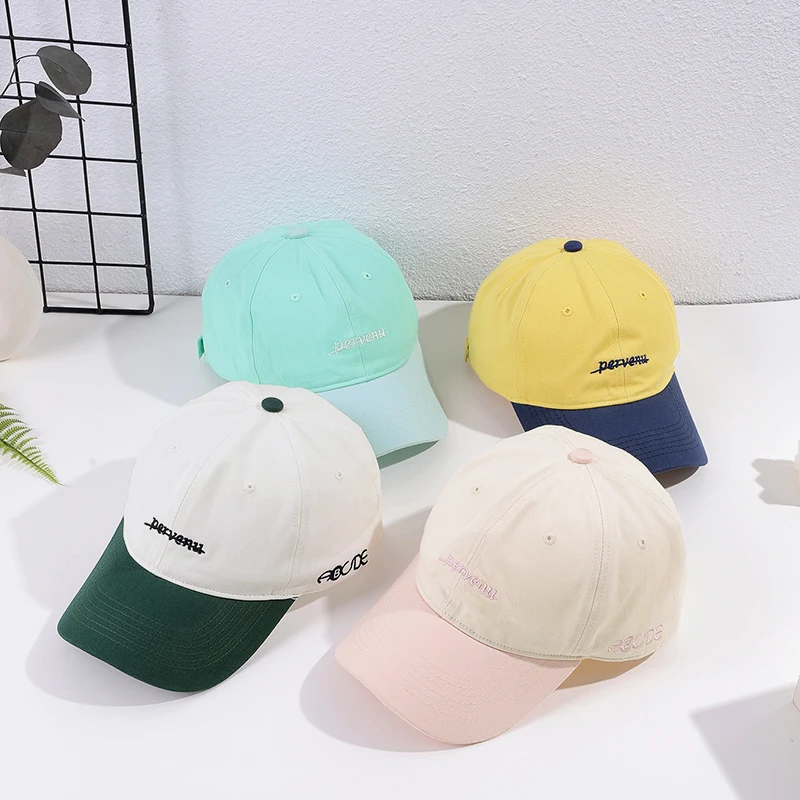 The new soft top Macaron color embroidered small letter copper buckle baseball cap fashion casual splice shade cap