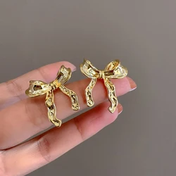 AENSOA Unique Bow Design Small Metal Stud Gold Color Earrings for Women Sweet Ribbon Bow Knot Nail Earring Fashion Cute Jewelry