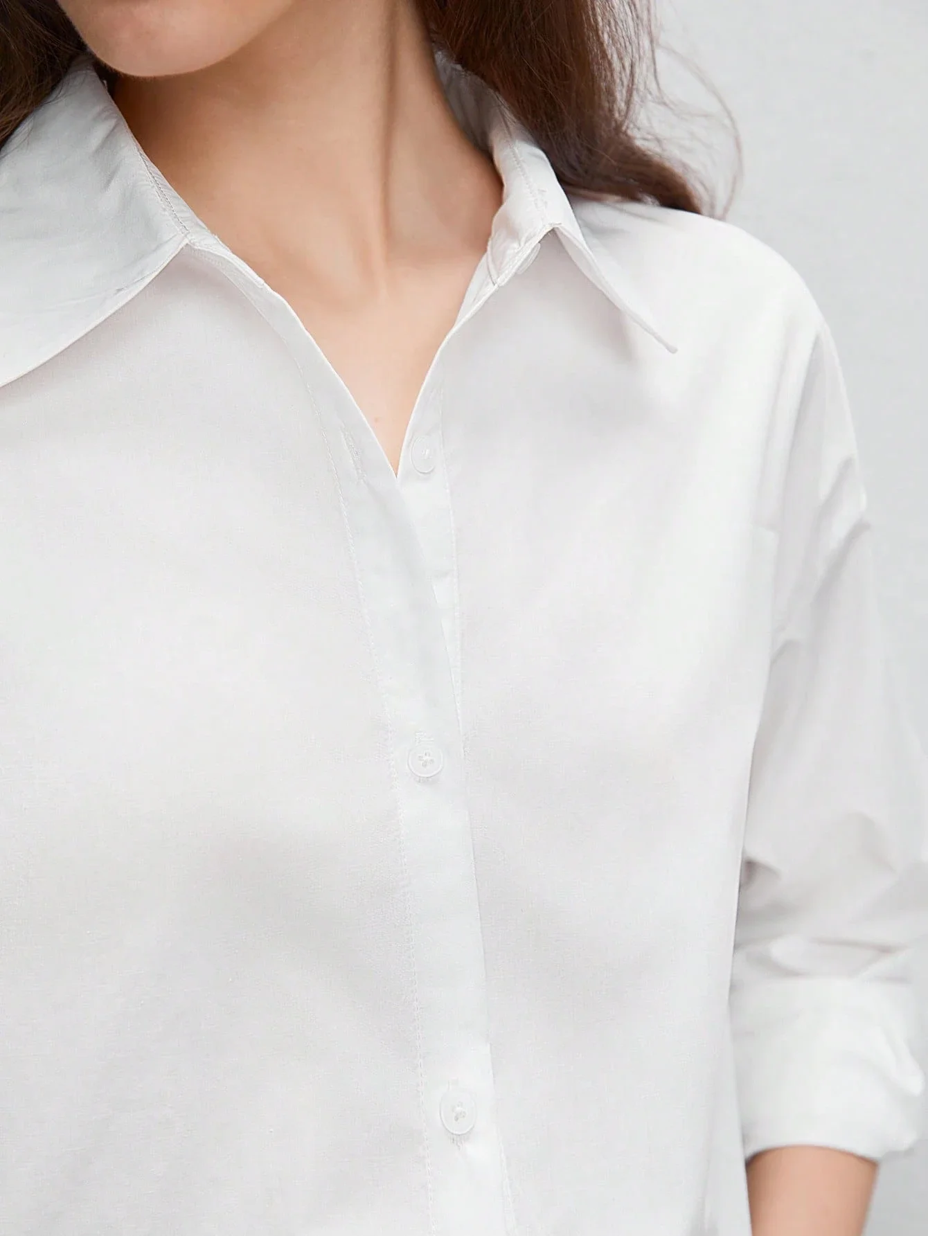 

Women's White Solid Color Dropped Shoulder Curved Hem Button Down Long Sleeve Oversized Shirt