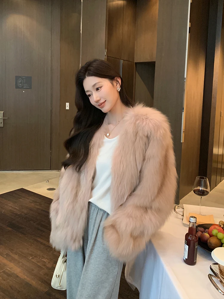 Abrigo de piel de zorro importado finlandés joven y abrigo de piel para mujer