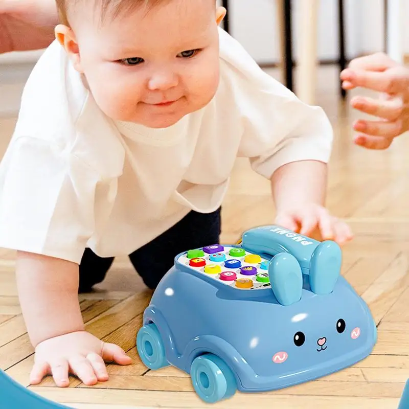 لعبة هاتف للأطفال، لعبة سحب السيارة مع عجلات على شكل أرنب، رواية القصص، لعبة موسيقى كرتونية ممتعة، لعبة المشي للأطفال