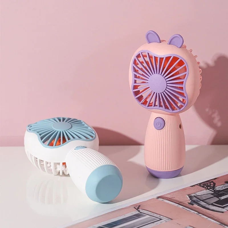 Petit ventilateur électrique de style dessin animé créatif, mini ventilateur portable, super vent de bain, endurance durable, chargement USB pour étudiants, nouveau