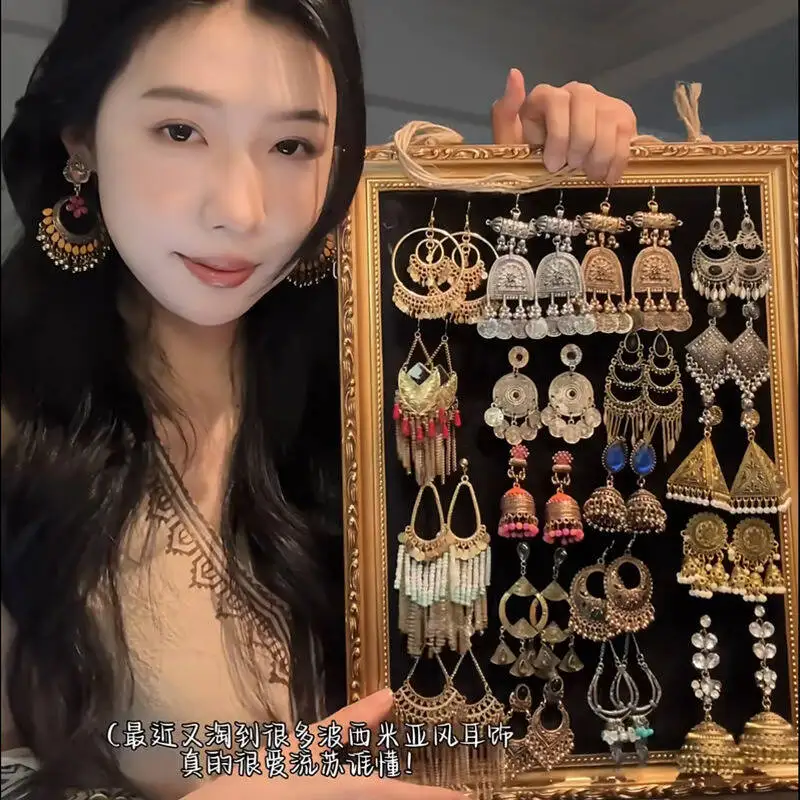 Elegant Vintage Ethnic Style Round Hollow Bohemian Elegant Niche Fashion Light Luxury Earrings Women