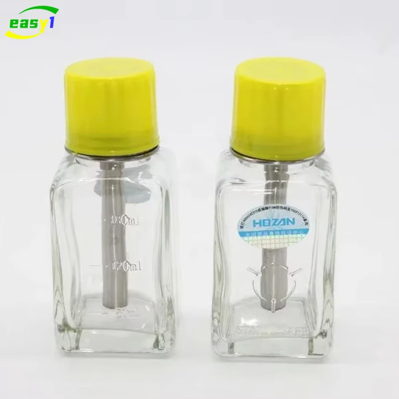 HOZAN 180 مللي نوع الصحافة زجاجة كحول زجاجية صغيرة مسامية دفع من نوع مكافحة رذاذ مكافحة حجب زجاجة تنظيف من الفولاذ المقاوم للصدأ