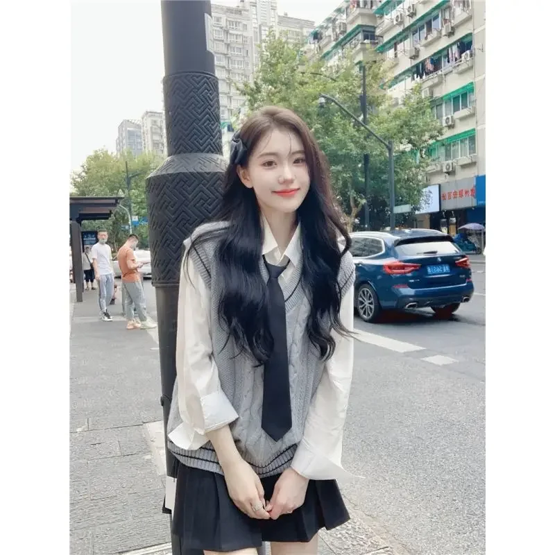 Otoño nuevo Japón mujer moda Corea escuela Jk uniforme estilo universitario chaleco tejido con cuello en V camisa + Falda plisada conjunto de uniforme Jk