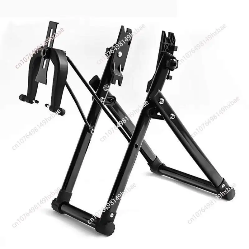 Folding bicycle rim table, repair tool, bicycle wheel hub aligner