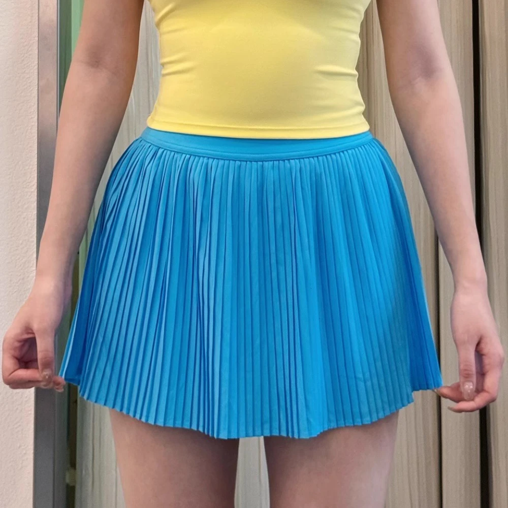 

Women Pleated Sports Tennis Skirts A-Line Sliming High Waist Mini Yoga Fitness Short Skirt With Pockets Gym Workout Golf Skorts