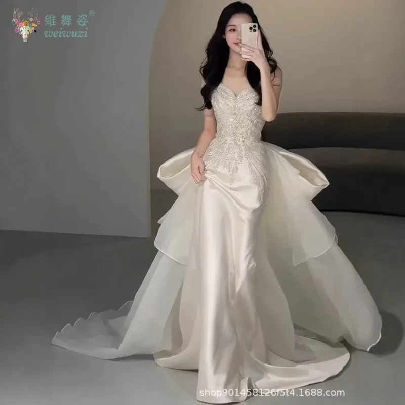 2025 nuevo vestido de novia de satén de estilo francés, vestido de novia de cola grande con lazo bordado de cuentas hecho a mano exquisito sin tirantes a la moda