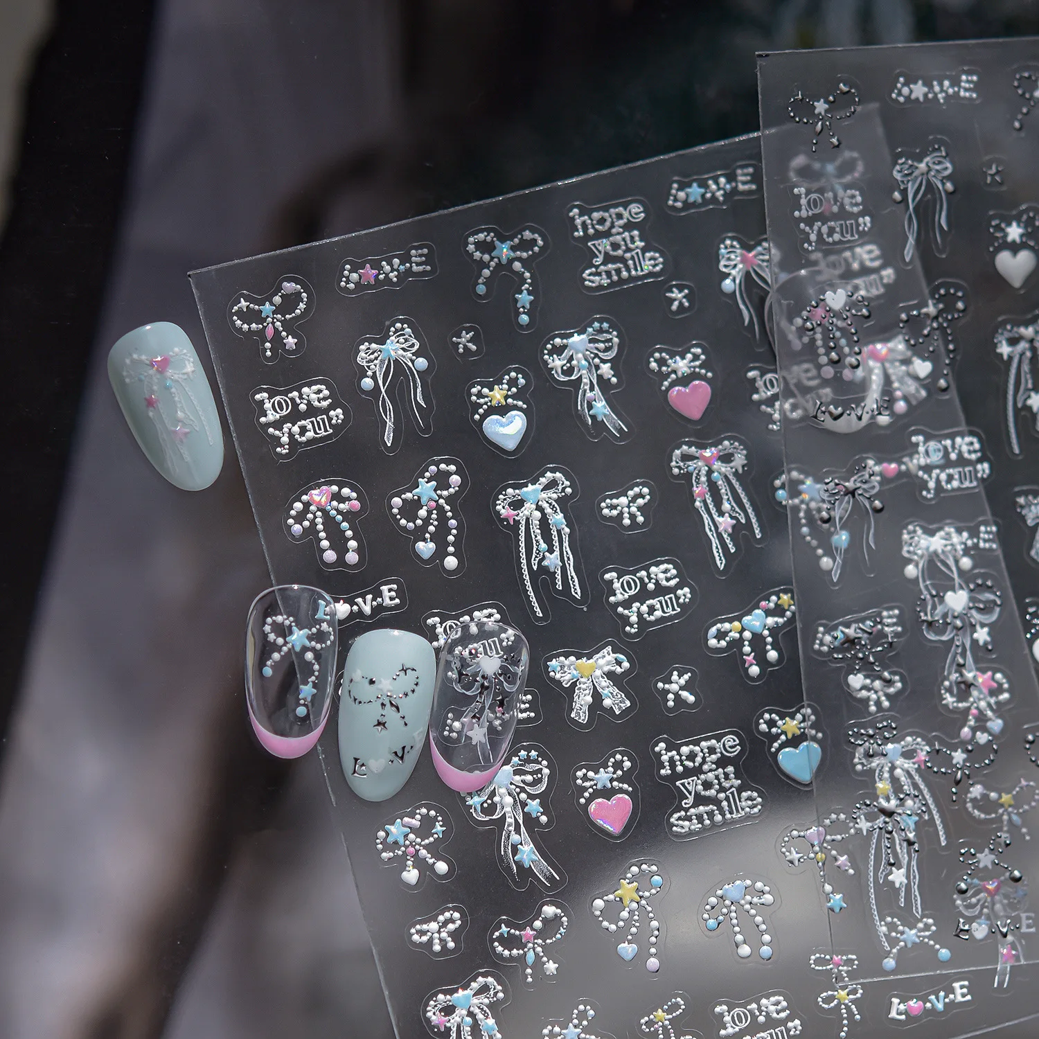 夢のような星の光で飾られた蝶結びのラブハートネイルステッカー高品質文学と芸術デザインアートデコレーション T-5317