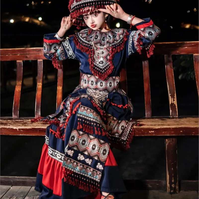 

Tassel national girl clothing female wind village travel photo exotic