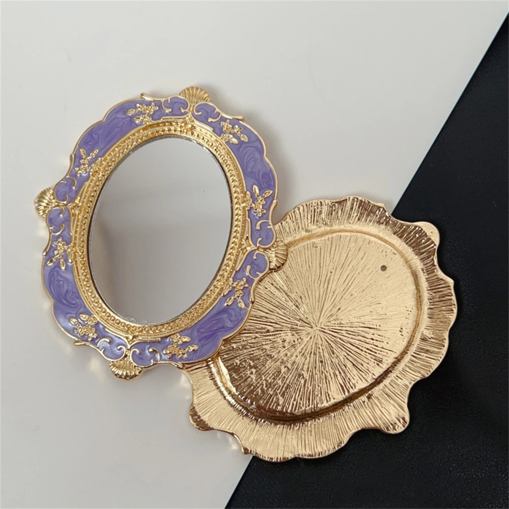 Specchio a mano in rilievo dorato Specchio per trucco europeo retrò Specchio portatile per la casa creativa Decorazione semplice Specchio in stile Grand imperiale