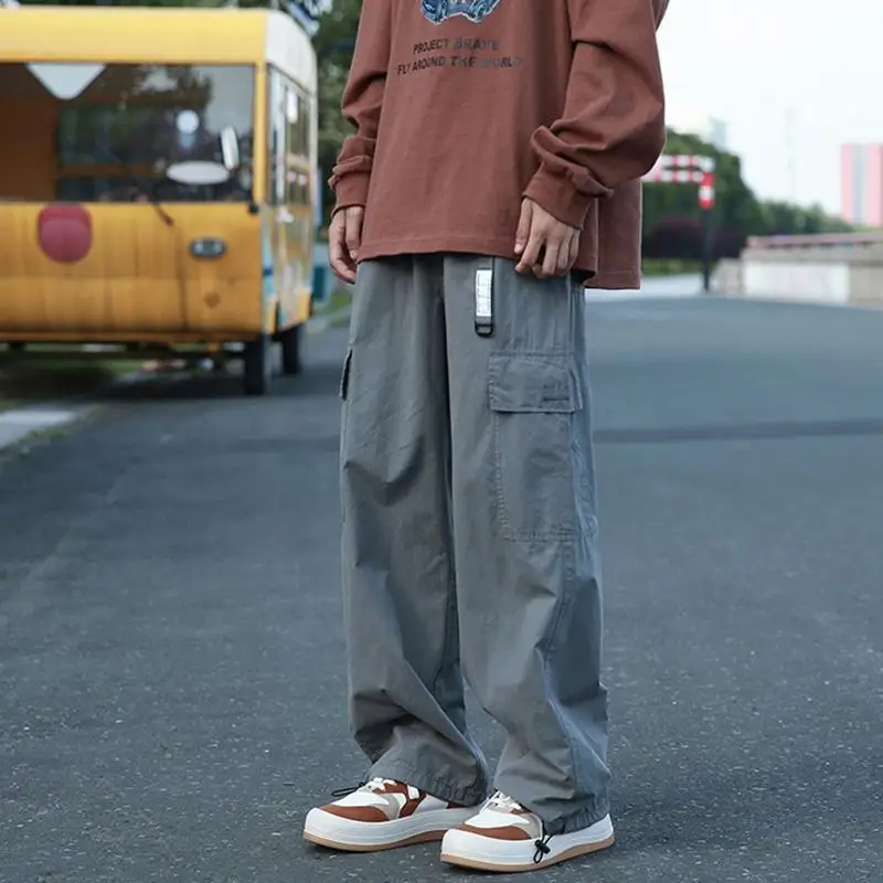 Spring Summer New Solid Color Elastic Waist Drawstring Cargo Pants Man High Street Cotton Loose Pockets All-match Straight Pants