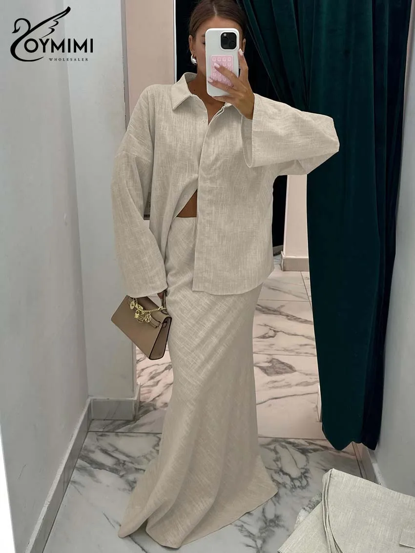 

Женский комплект Oymimi из премиального льна цвета хаки, 2 предмета: рубашка оверсайз и юбка-русалка с завышенной талией, весна 2026. Лаконичный и непринужденный образ.