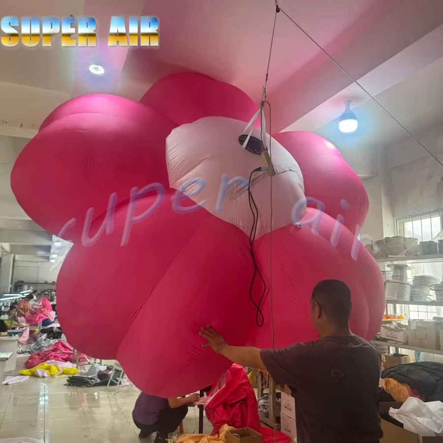 Modelo de planta enorme súper aire utilizado para publicitar una flor rosa inflable huanging
