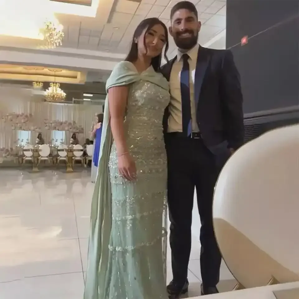 

Customized 2025 Arabic Sage Green Mermaid Beaded Luxury Formal Evening Party Dress With Cape for Formal Occasion