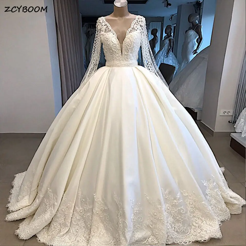 

Elegant Ivory Ball Gown Illusion Long Sleeve Wedding Dresses 2023 Satin V-Neck Glitter Pearls Beaded Appliques Women Bride Gowns