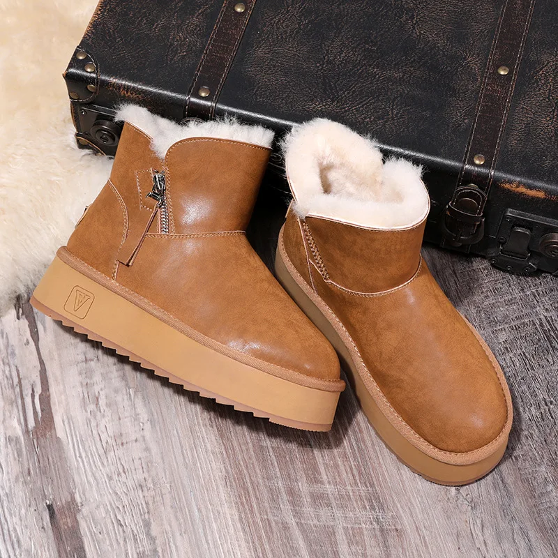 

Women's thick-soled genuine leather winter new short-tube thick warm snow boots