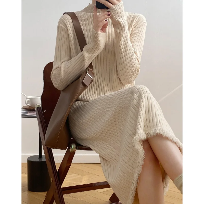 Autumn and winter new semi-turtleneck sweater women's medium and long knee coat base with fringed skirt knitted dress