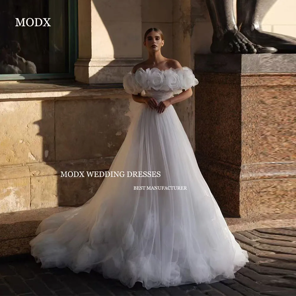 

MODX 3D Цветы A Line Белые свадебные платья с открытыми плечами и скользящим шлейфом Свадебные платья Robe de mariage Custom Made 2025 США Женщины
