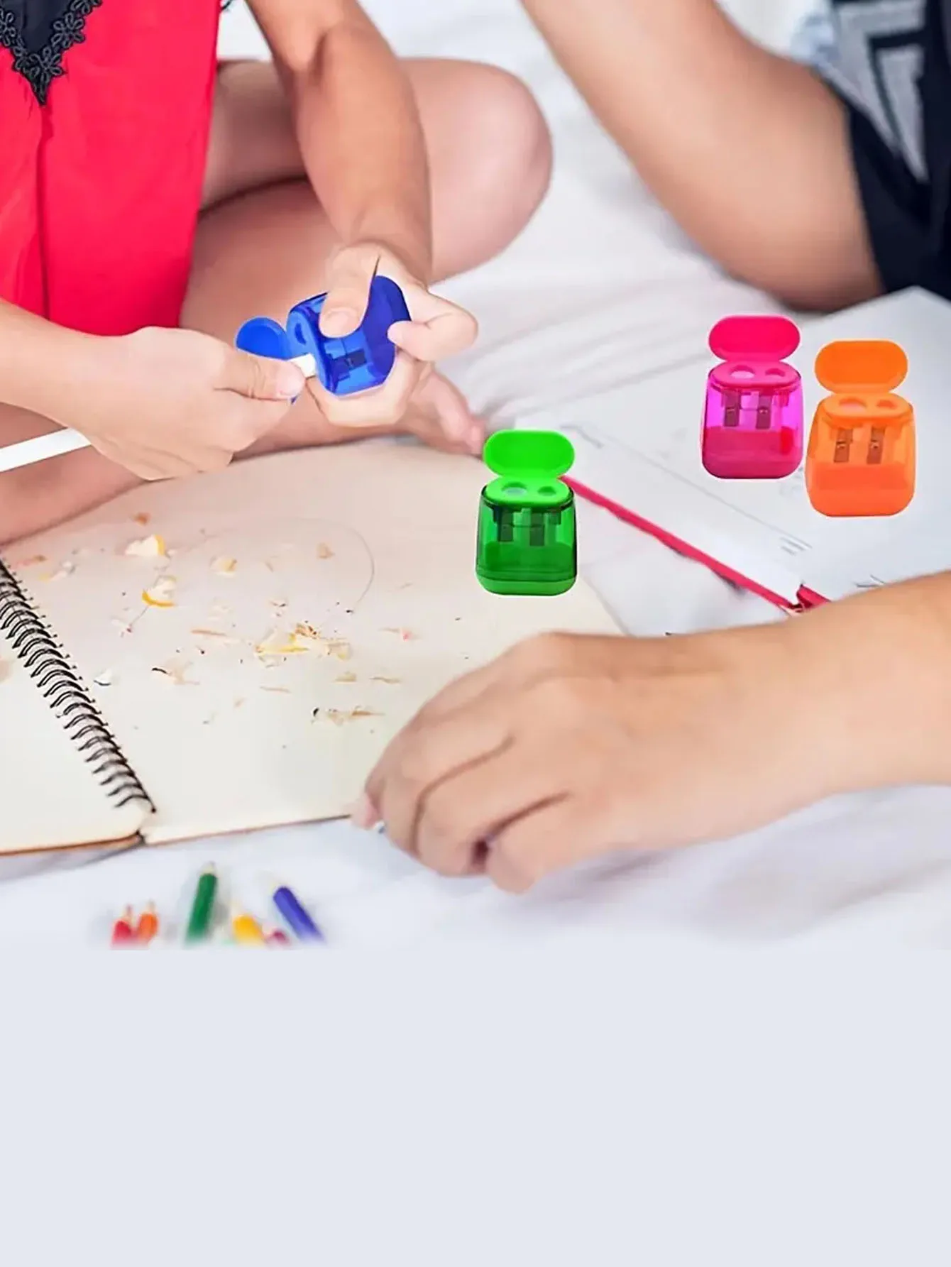 A color random student two-hole pencil sharpener for children\'s school supplies - a must-have for starting school