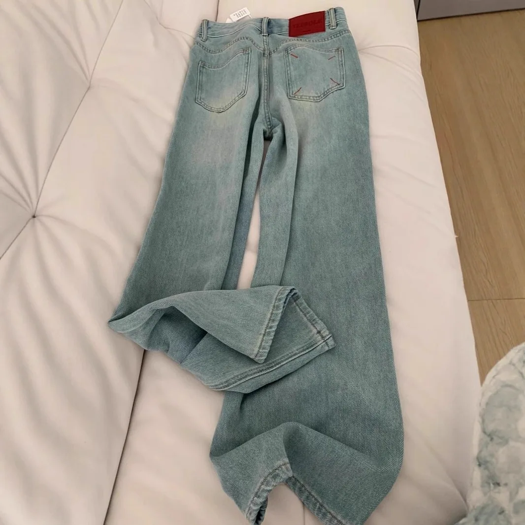 

embroidered wide-leg jeans, loose fit, plus size, high-waisted, slimming for pear-shaped body, straight-leg, floor-length pants
