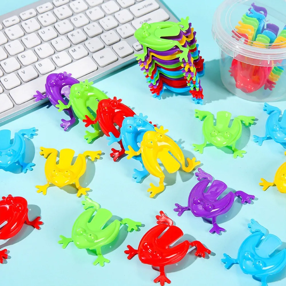 Lustiger springender Frosch aus Kunststoff, zufällige, hüpfende, lustige Spielzeuge, transparentes/einfarbiges Froschspielzeug