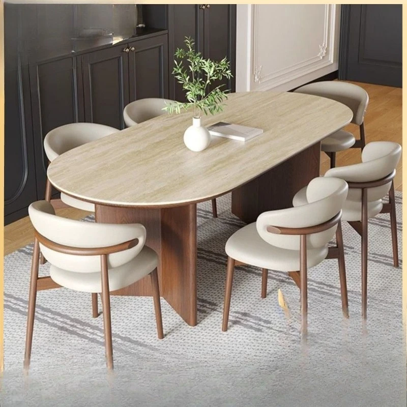 

Dining table and chairs new oval small apartment household rock slab medium ancient style 2025 French combination cave stone mea