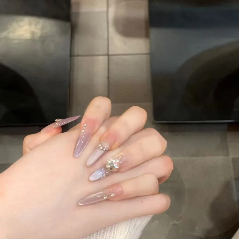 10 قطع من أظافر صناعية طويلة جداً بلون عين القطة الأرجواني مع أحجار الراين، أظافر كورية للنساء مع علبة وأدوات