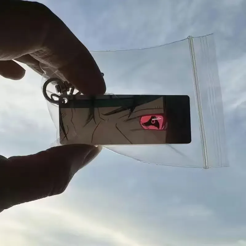 Llavero Naruto acrílico luz solar Uchiha Itachi ojos brillantes Rectangular patrón de doble cara nueva mochila colgante decoración juguete