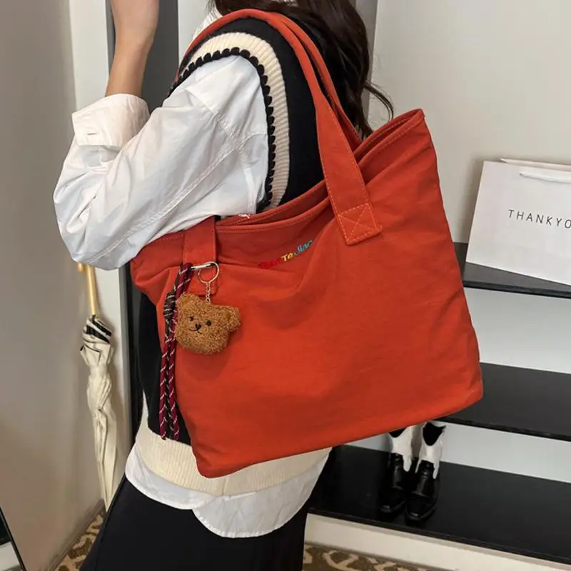 bolsa-tote-estilo-hippie-em-cor-solida-harajuku-2024-nova-bolsa-casual-com-letras-para-estudantes-universitarios-bolsa-transv