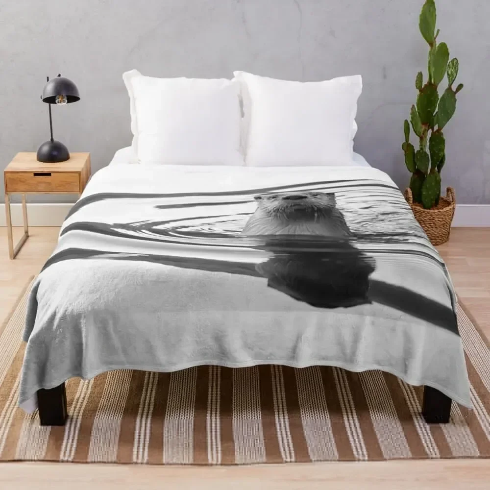 

Otter in the Water Throw Blanket