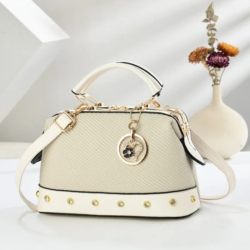 

Fashionable Women's Boston Pillow Bag Metal Rivet Women's Small Square Handbag PU Material City Style Crossbody Shoulder Bag