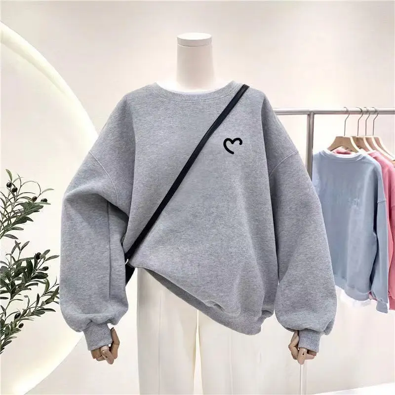 "His & Hers K-Style Tees. Unique prints, soft fleece, and an effortless oversized fit for couples."