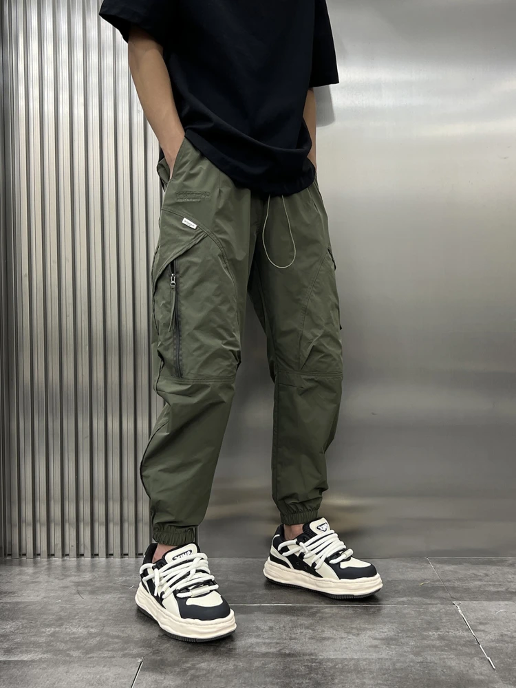 

Модные облегающие брюки для спецодежды, мужские летние тонкие шаровары с застежкой-молнией и манжетами, уличные повседневные брюки из девяти предметов, свободная эластичная талия