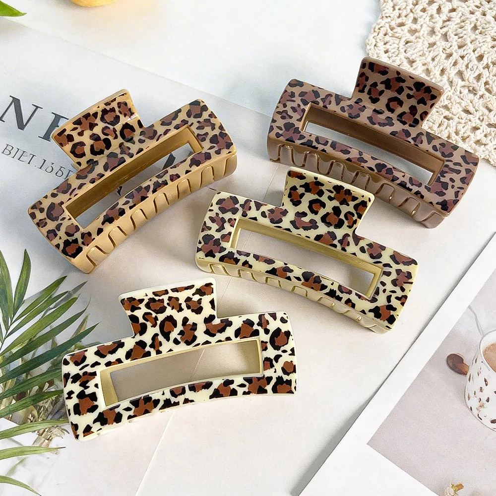 

Набор из 4 заколок для волос с леопардовым принтом, большие стильные женские заколки для волос коричневого цвета, нескользящие и модные.