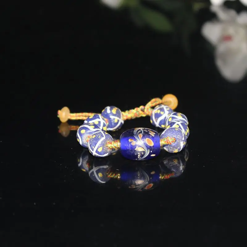 

Vintage Glass With Blue Tail Drum Shaped Bead Beads Bracelet