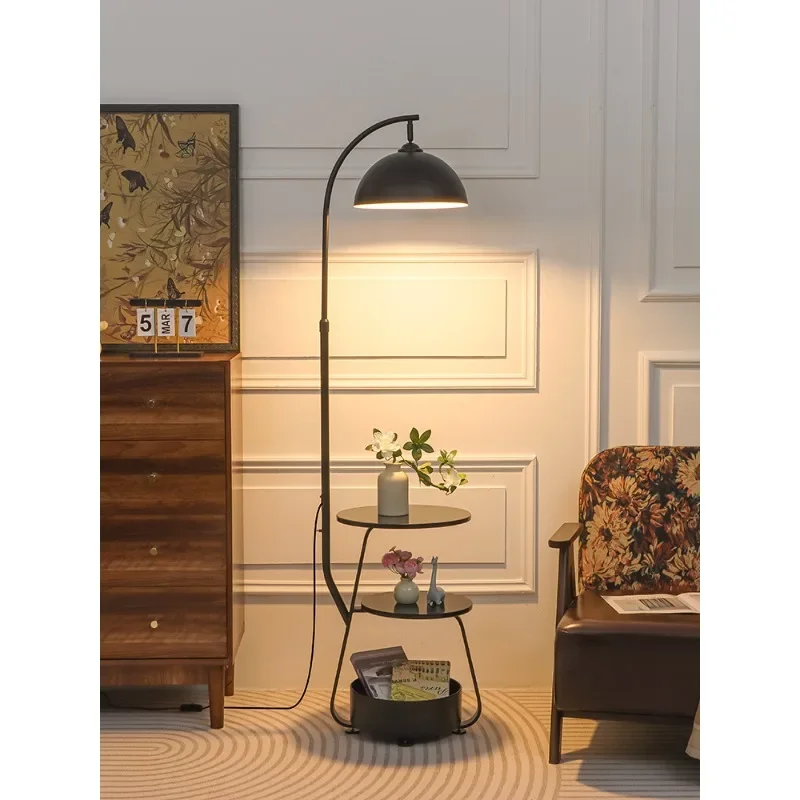 Modern simple floor lamp, a few objects next to the sofa in the living room, high-grade cream wind bedroom bedside