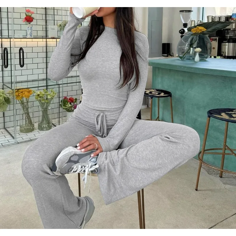 

2025 Новый женский осенне-зимний модный укороченный топ с длинными рукавами, облегающий галстук и расклешенные брюки, повседневный комплект