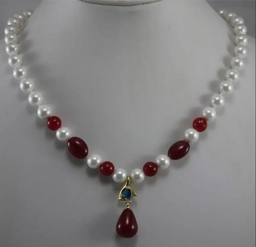 

Модный дизайн 7-8 мм белый жемчуг + красное яйцо аксессуары металлическое ожерелье кулон