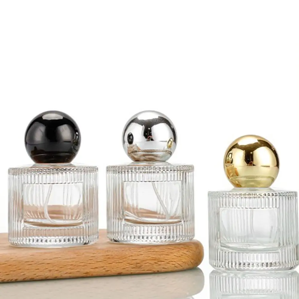 MIni bouteille transparente rechargeable atomiseur presse type distributeur atomiseur Rechargeable bouteille en verre vide voyage