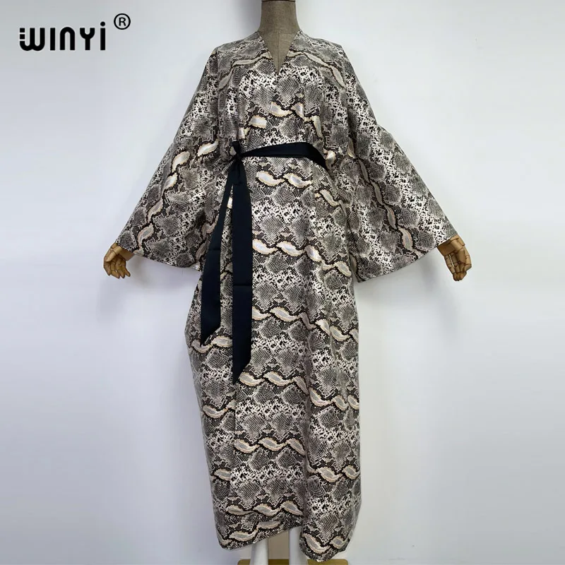 

WINYI Africa Winter Women Artificial leather windbreaker Cardigan coat fashion Loose dress with belt longue Thick Warm Kaftan